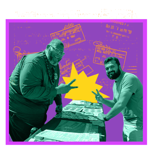 Two people at a ballot box