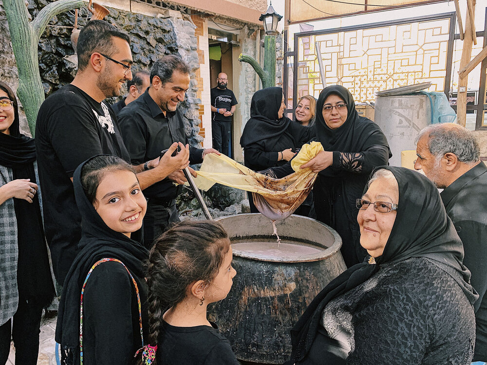 People preparing hot chocolate for offering, Kashan style