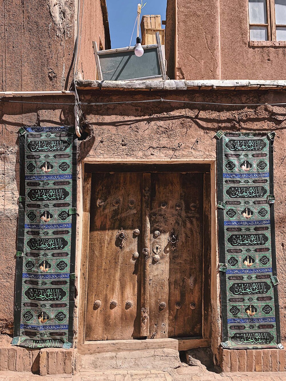 Door ornate during the Observances of the Muharram, Abyaneh, Iran