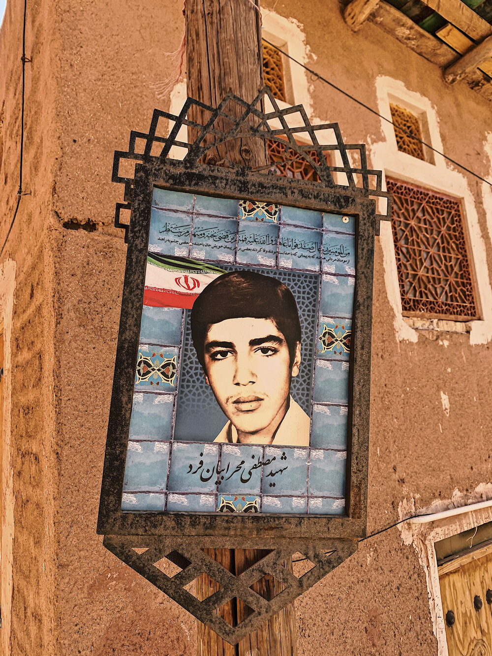 Image of a deceased man, streets of Abyaneh, Iran