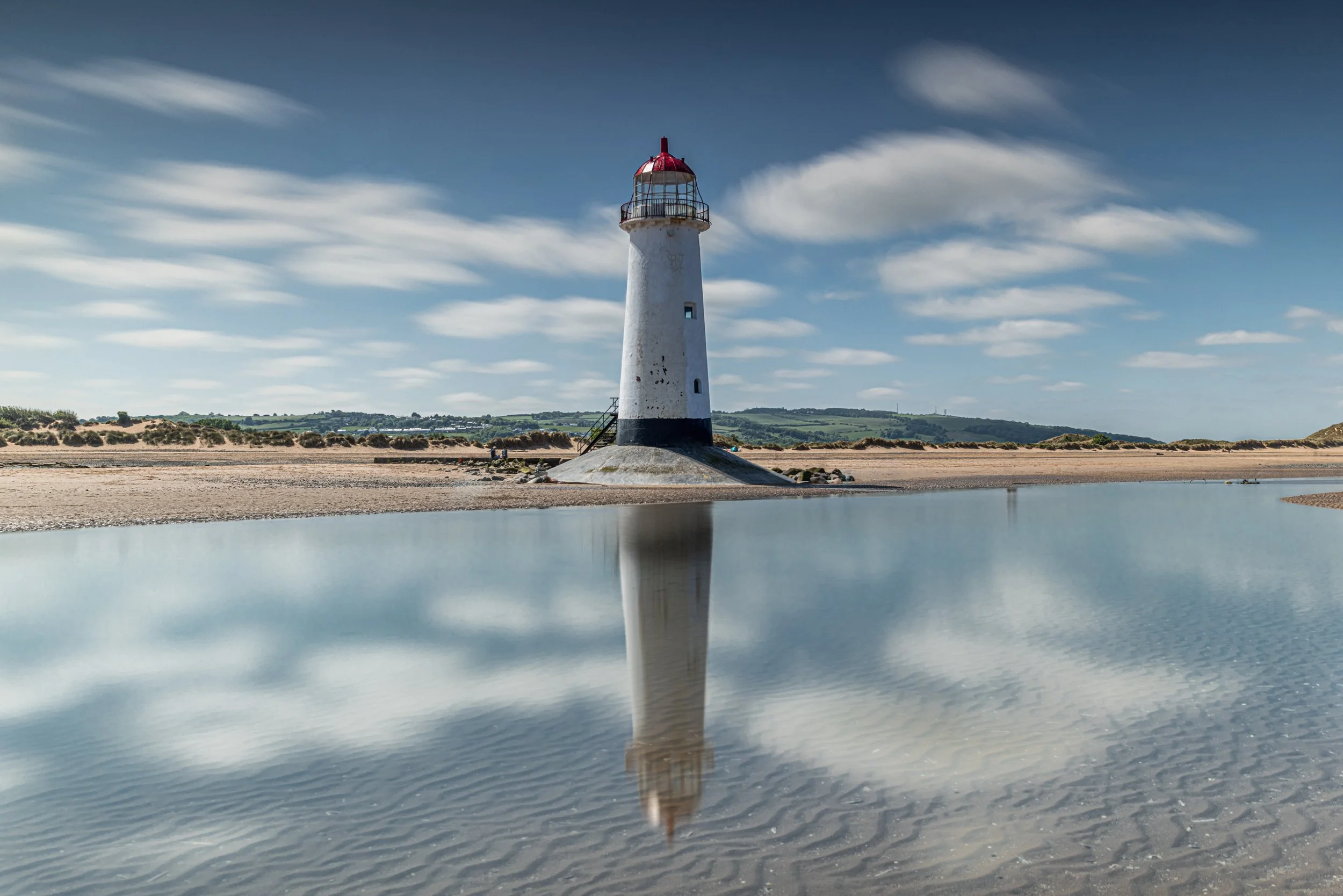 Point of Ayr lighthouse (Y Parlur Du) aka Telacre Lighthouse

The lighthouse was built in 1776 after the passing of the Chester Lighthouse Act of 1776 and was in use till it was replace in 1844 by a pile light.
