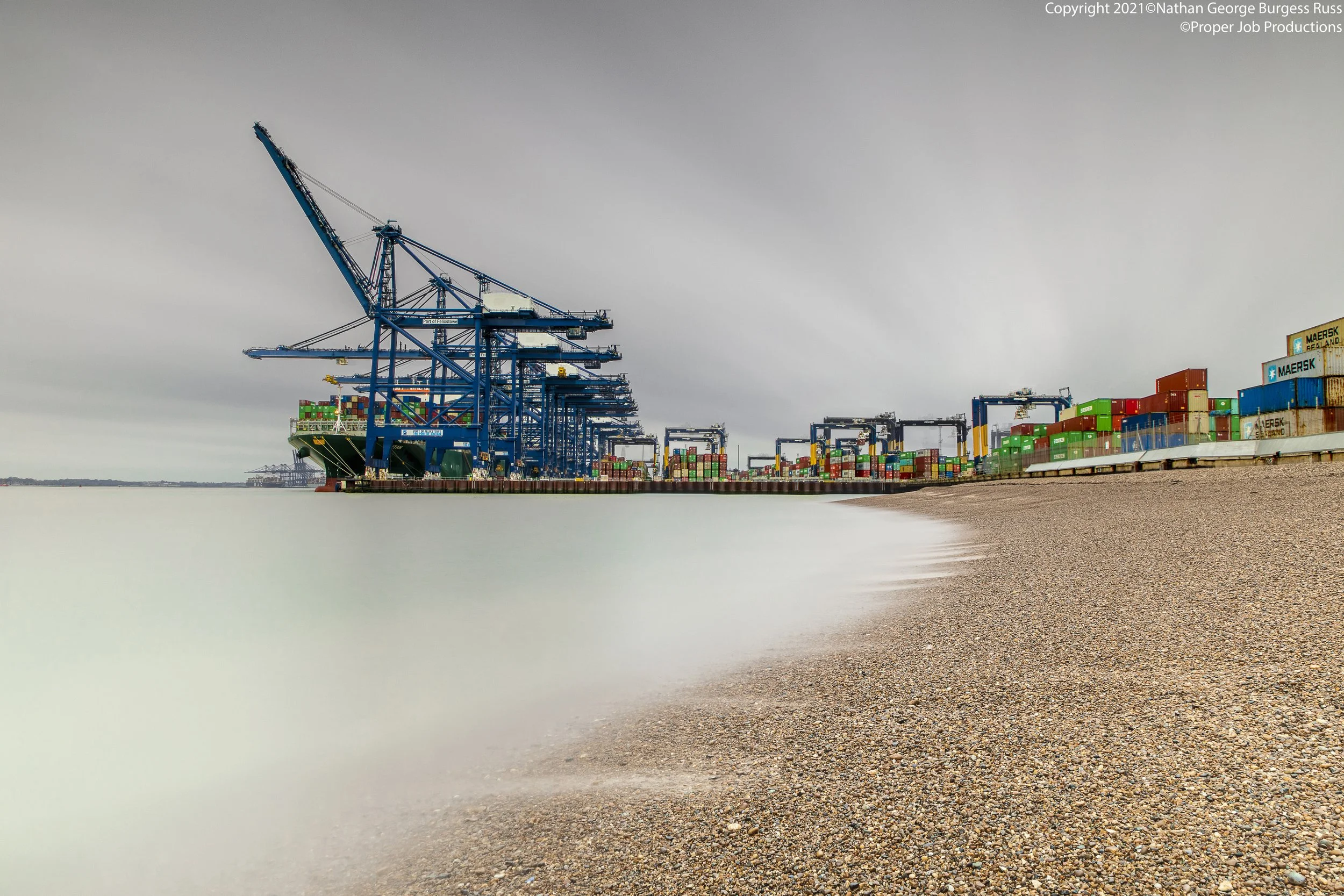 A 300 second long exposure of Felixstowe Docks Landguard Terminal, Landguard beach and the container ship Titan.

The Port of Felixstowe is the largest container port in the UK, the 8th in europe and 43rd in the world. The Port was created in 1875 as