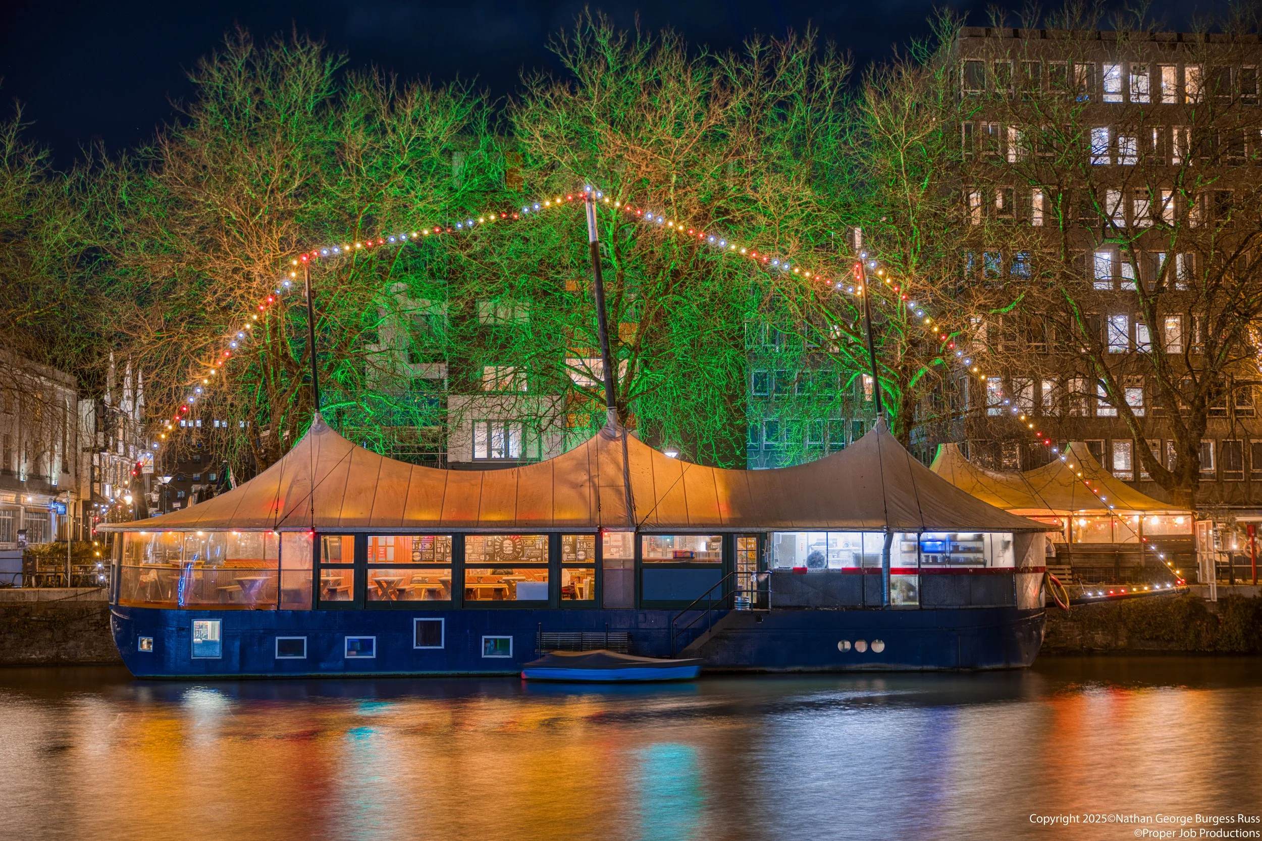 Three Brothers Burgers at night from the Redcliffe Back side of the river.
