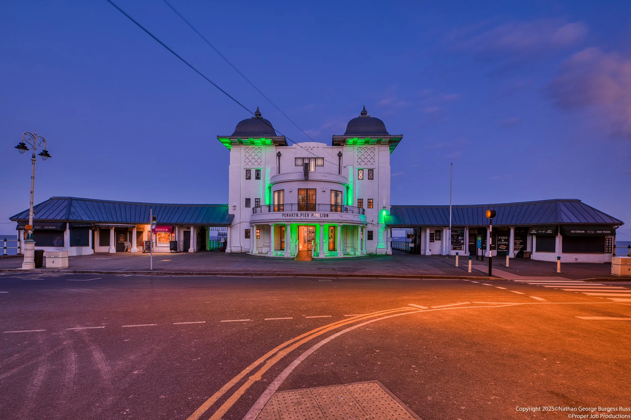 Penarth Pier Pavilion during evening blue hour.

Penarth Pier Pavilion is an Art Deco Pavilion built in 1929-1930 at the landside of Penarth Pier.  The Pavilion was restored in 2013 with a cinema, cafe, observator and community use area.