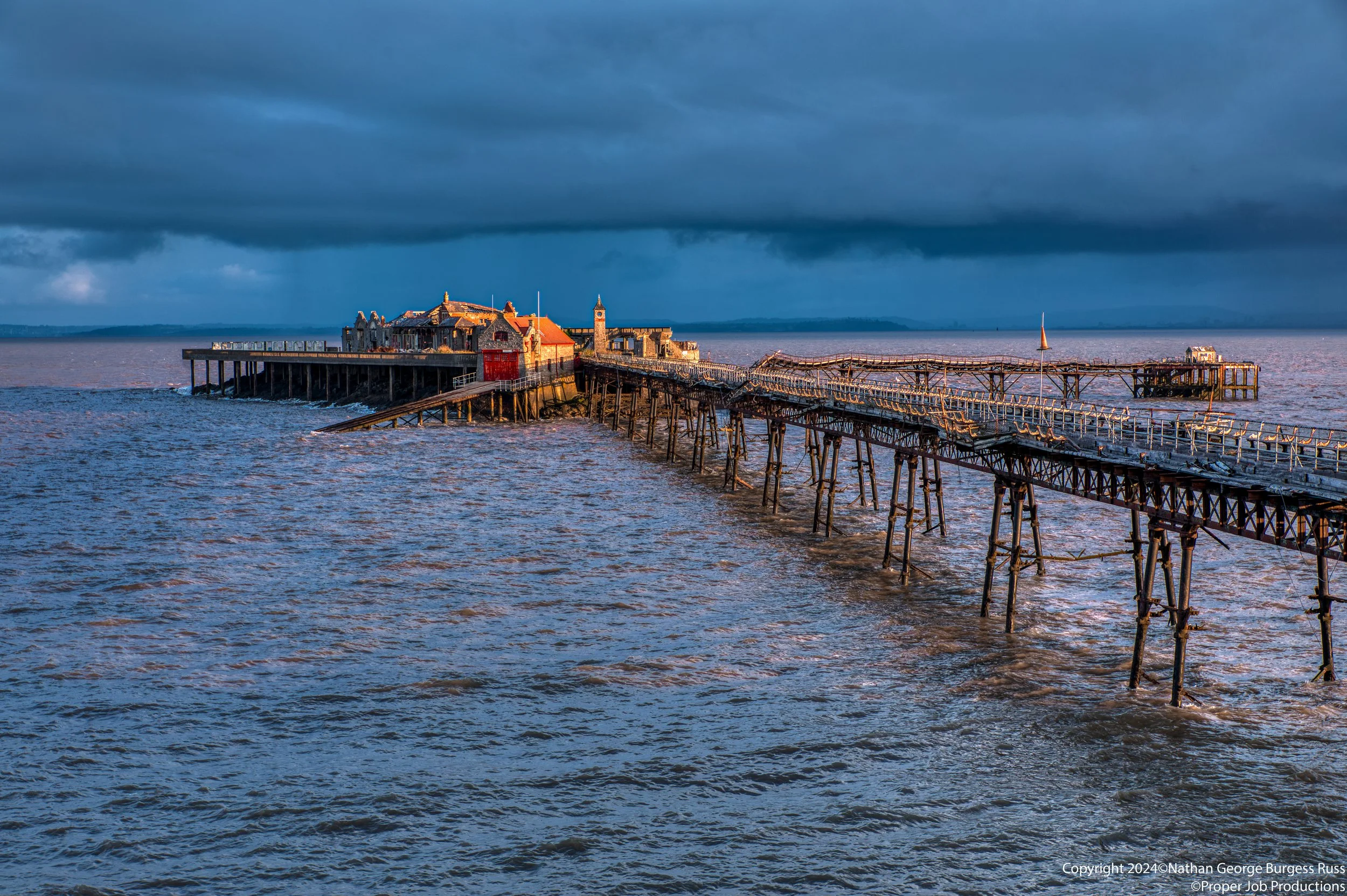 Birnbeck Pier was opened on the 5 June 1867, connecting Worlebury Hill to Birnbeck Island.
 
Eugenius Birch innovative design allowed for the pier to survive in the harsh tidal conditions found in the Bristol Channel. The Pier buildings and toll hous
