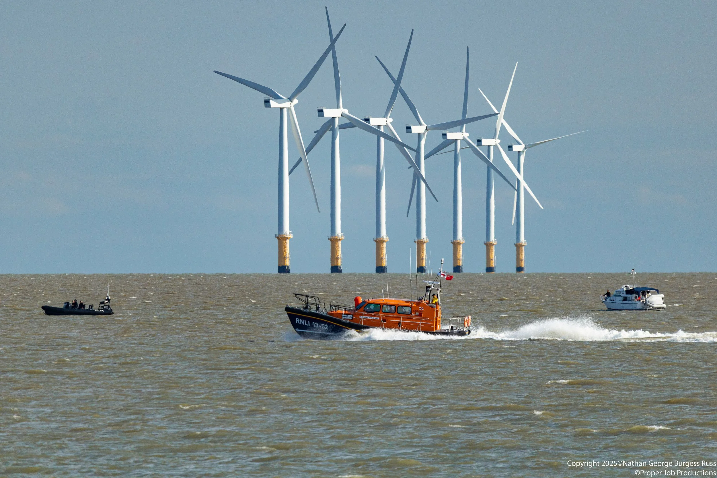 The RNLI's Chris and Jo West 13-52 passing the Gunfleet Sand Offshore Wind Farm off the coast of Clacton-On-Sea.

The Royal National Lifeboat Institution introduced the Shannon Class in 2014, with the Chris and Jo West being delivered to Clacton-On-S
