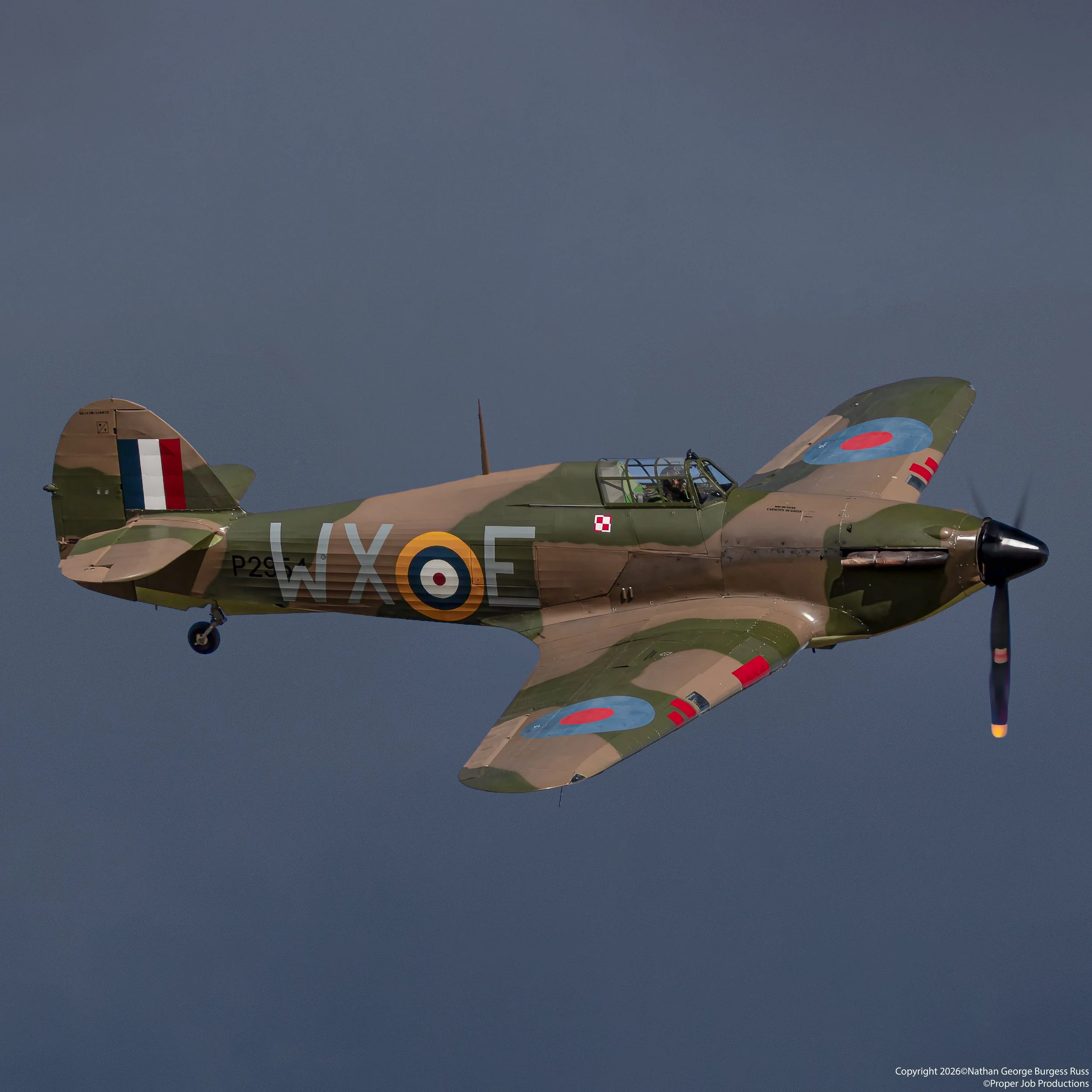 This Hawker Hurricane XIIA was originally built in Fort William at the Canadian Car and Foundry.  She was delivered to the Royal Canadian Air Force (RCAF) with the tail number 5711 in 1942.

She was initially delivered to 123rd (RCAF) Squadron at Deb
