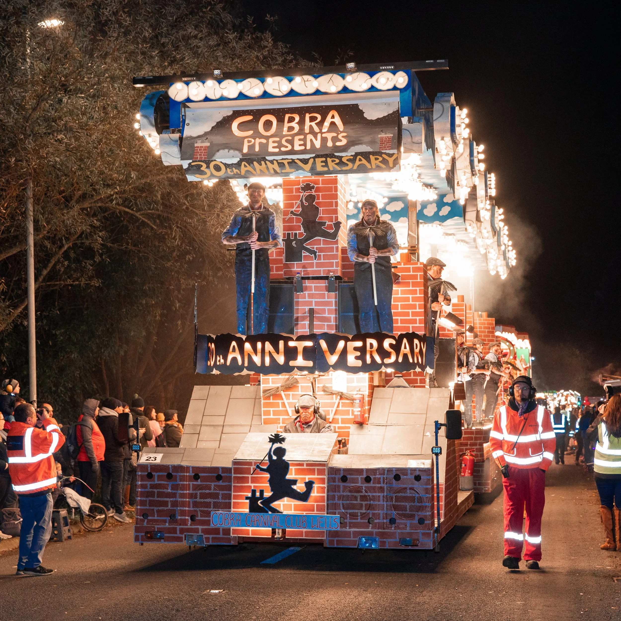 Over the Rooftops by Cobra Carnival Club at Glastonbury Carnival 2022.  

This feature Cart was inspired by the song "Step in Time" from Mary Poppins