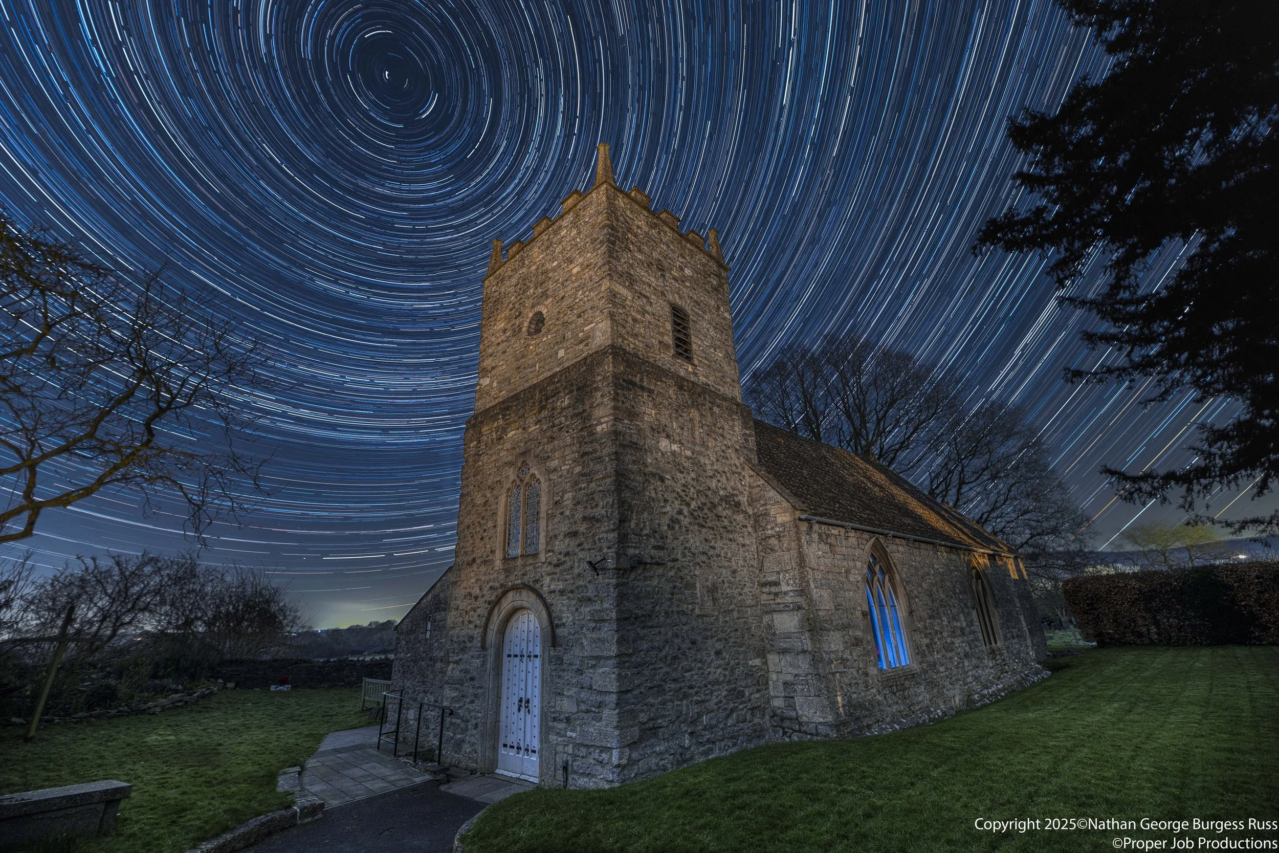 Star trails above Saint Mary's Church in Saltford.

Saint Mary's was originally founded in the late Anglo-Saxon period with most of the church dating back to the Norman period. The Church was restored and expanded shortly after the end of the English
