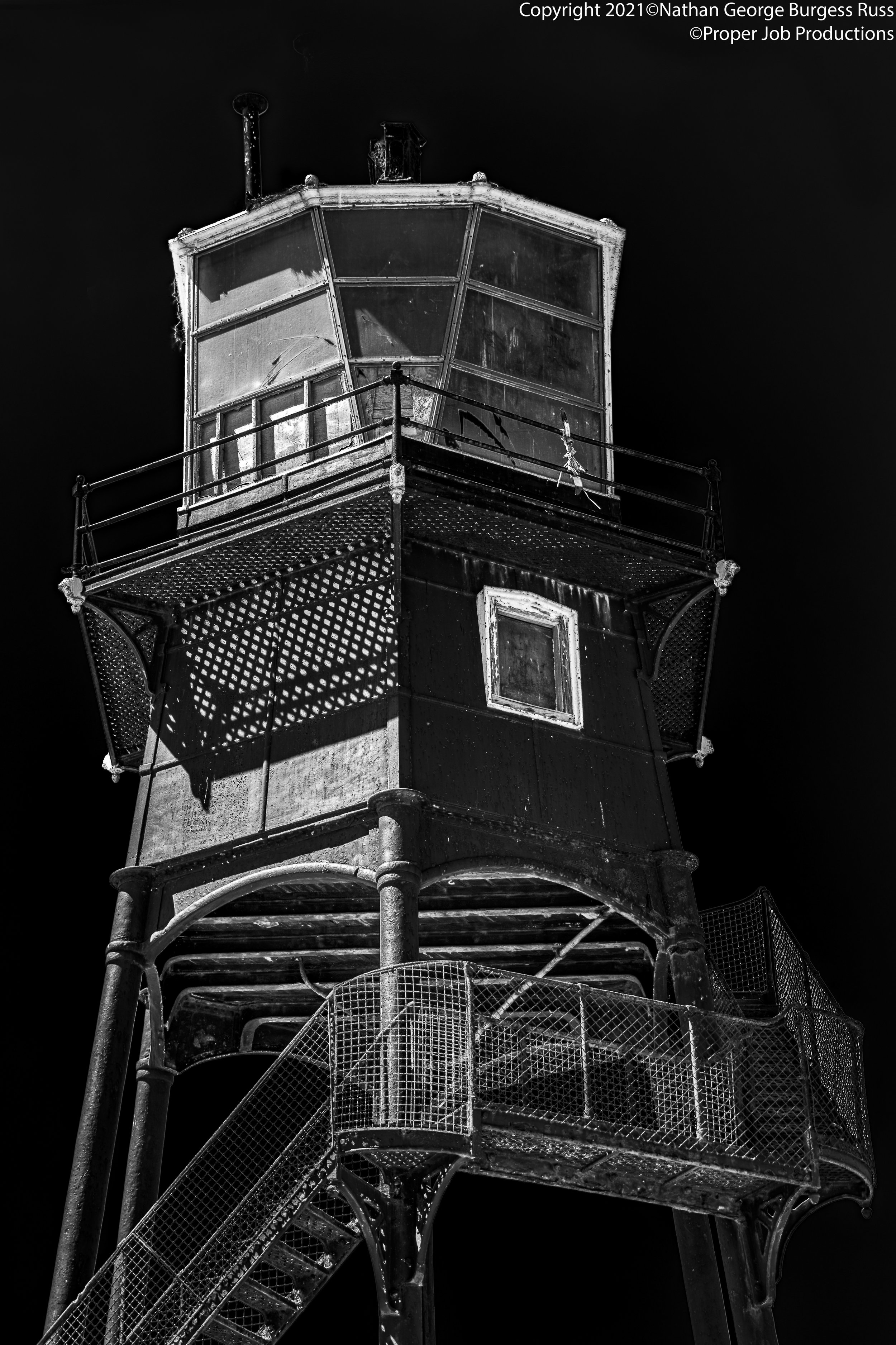 Black and white of Dovercourt High Lighthouse during the day.

The Dovercourt Low and High Lighthouses were built as a pair in 1863, both lighthouses are built in the same hexagonal shaped design. The Lighthouse is 15 meters tall and supported by 6 i