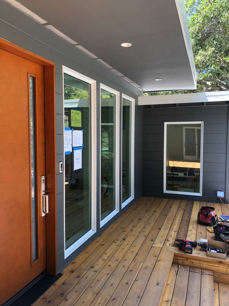 Grey House With Cedar Deck &amp; Unique Front Door