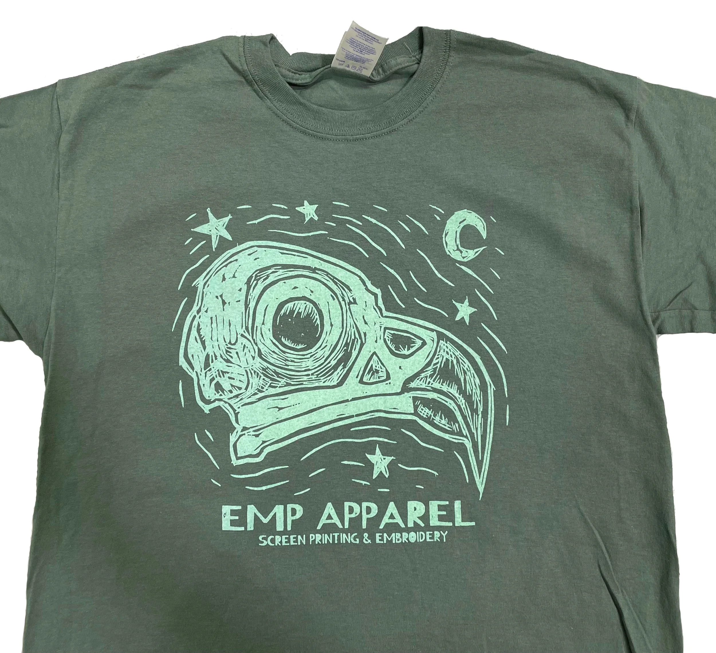  Osprey skull illustration for EMP Apparel shop shirts, screen printed in a variety of colors, made in 2024. 