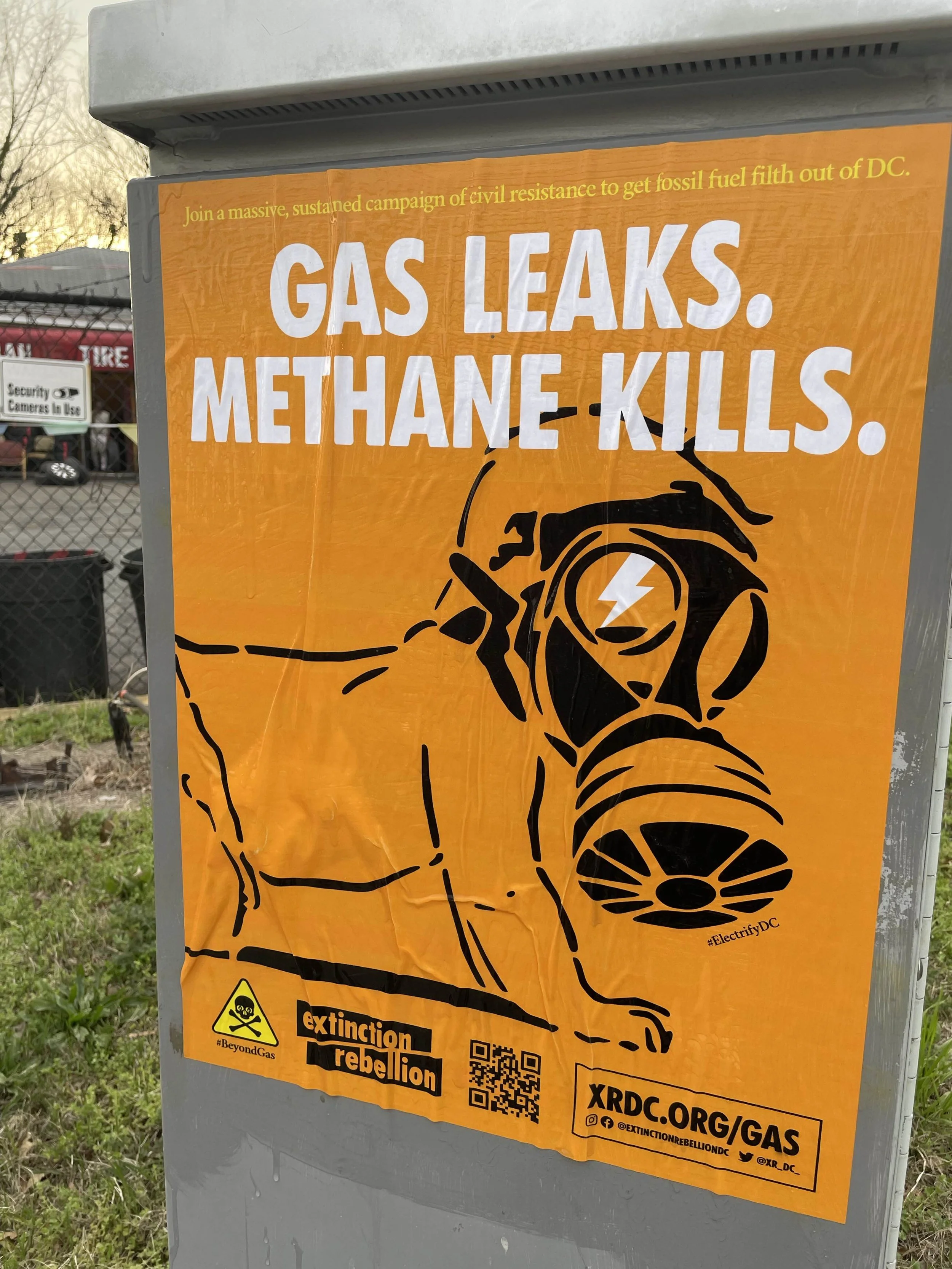 Extinction Rebellion disrupts political forum to demand an end to Washington Gas' methane bomb