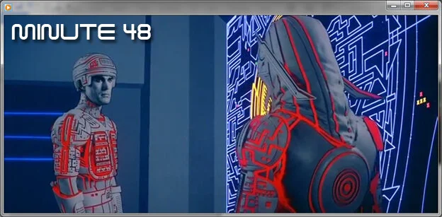 In this minute, Flynn, Tron and Ram successfully evade the tanks and hide out in a cave while Sark gets very, very angry at his long-suffering lieutenant. Returning to the podcast for this minute as guest co-host is Jack Stovold. Also available on A…