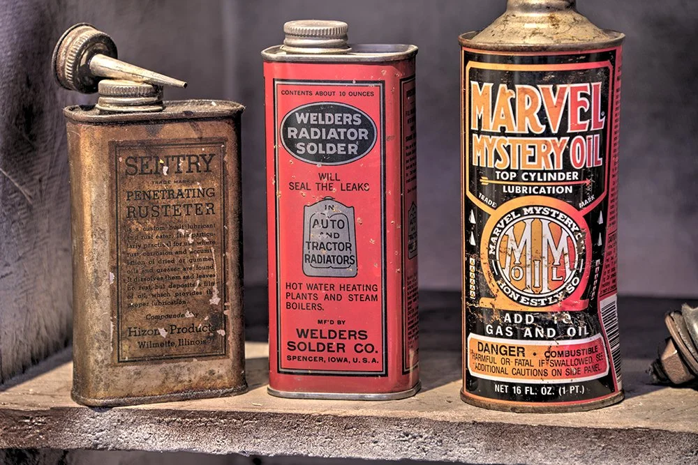 Vintage Oil, Solder, and Rusteter Cans Print