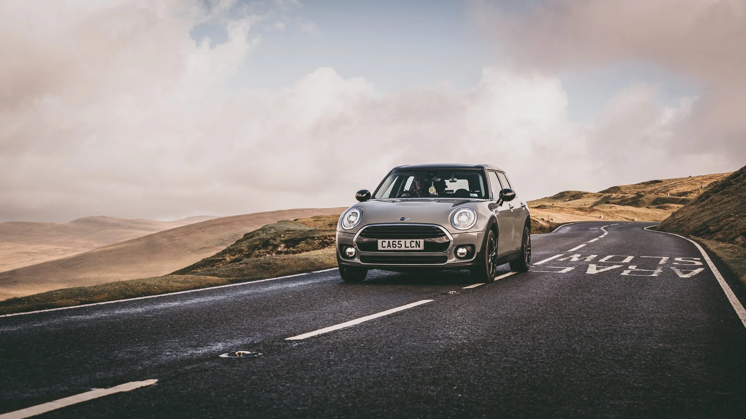 Mini Clubman on an open mountain road