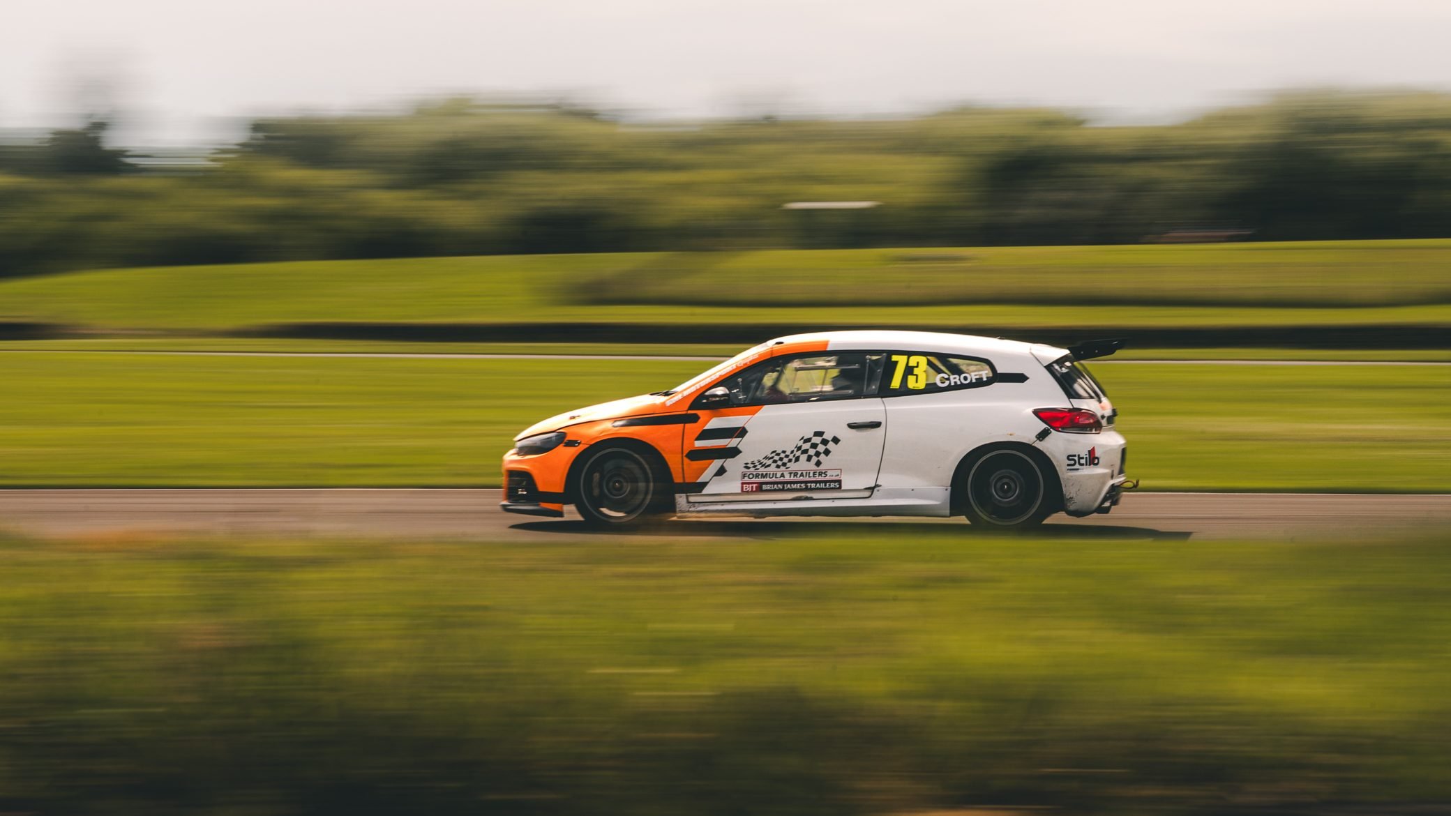 Hatchback race car at speed, Pembrey Circuit