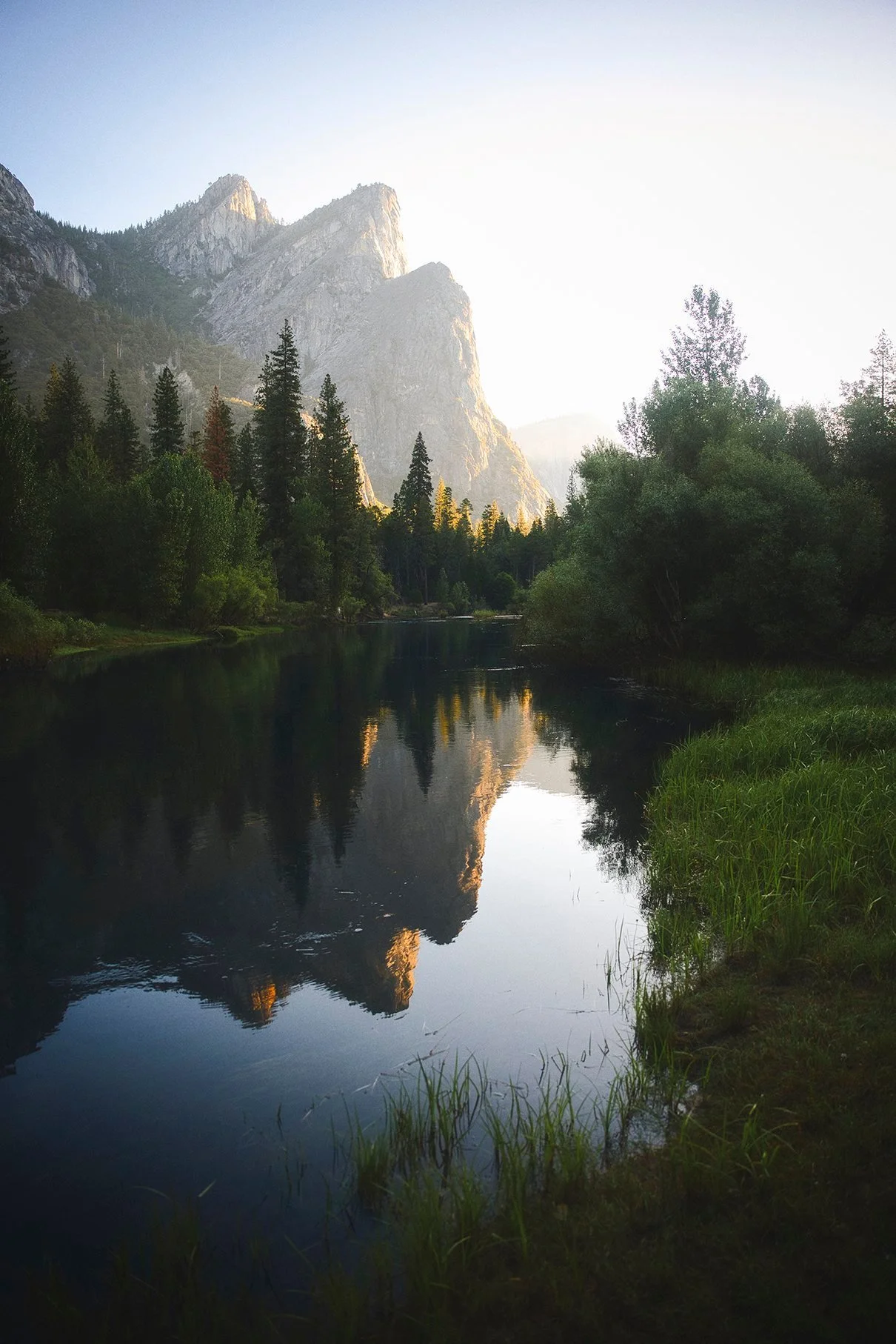 Cliffs reflected in a still river, Yosemite
