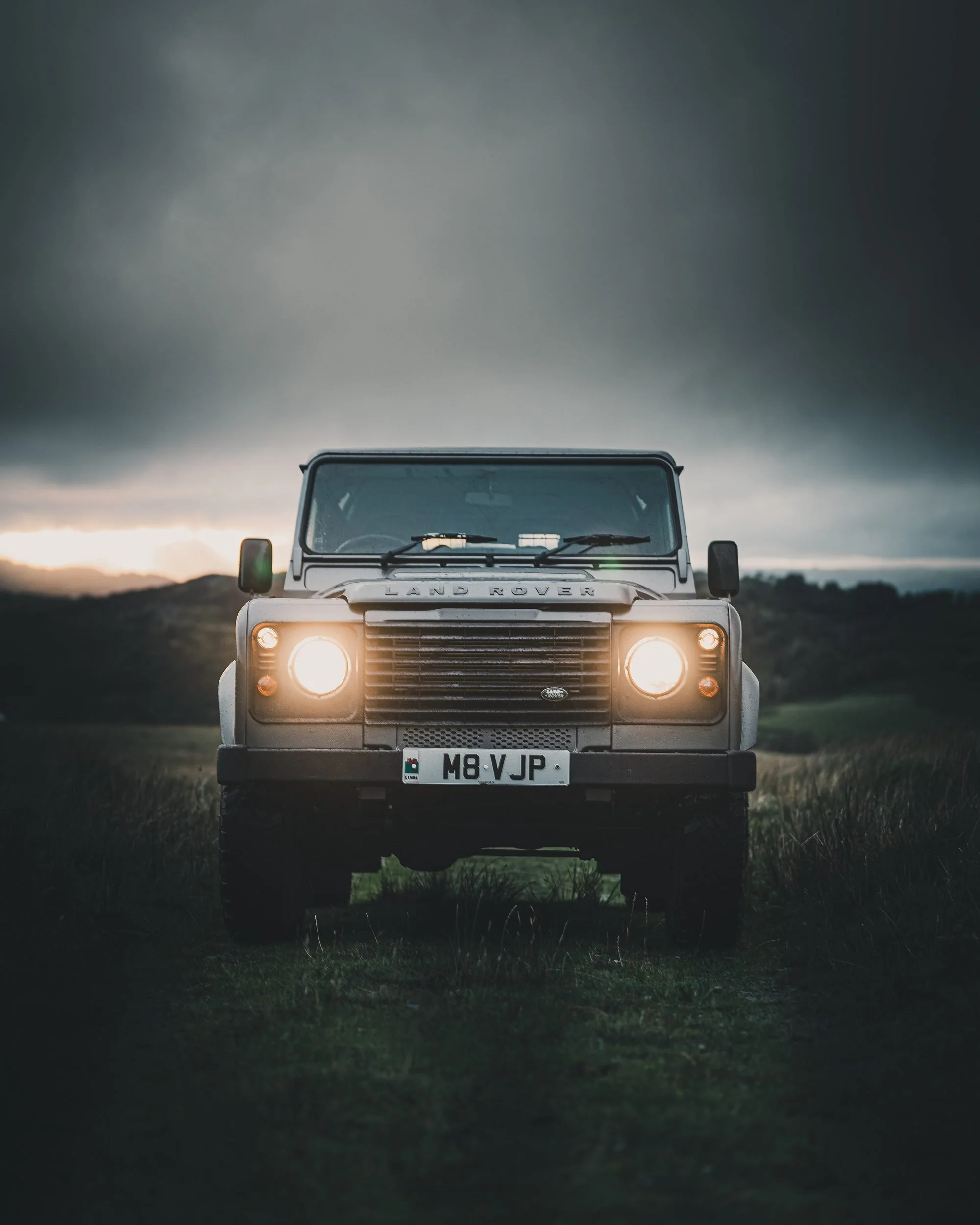 Land Rover Defender under a stormy sky, Bannau Brycheiniog