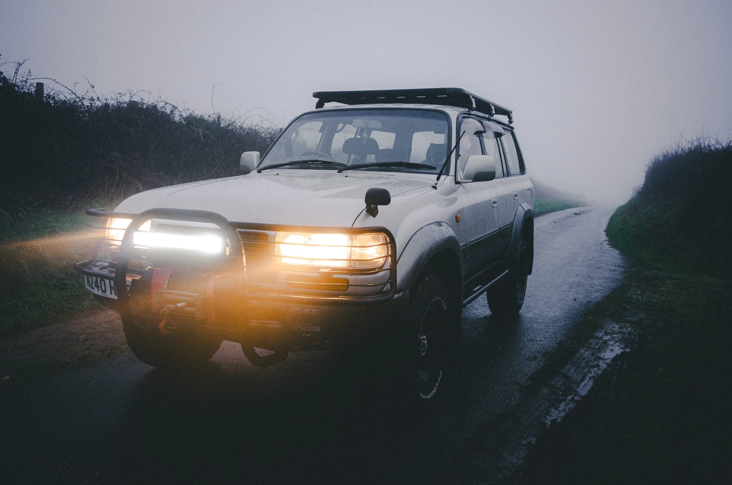 Land Cruiser 80 Series on a misty lane at dawn, Carmarthenshire