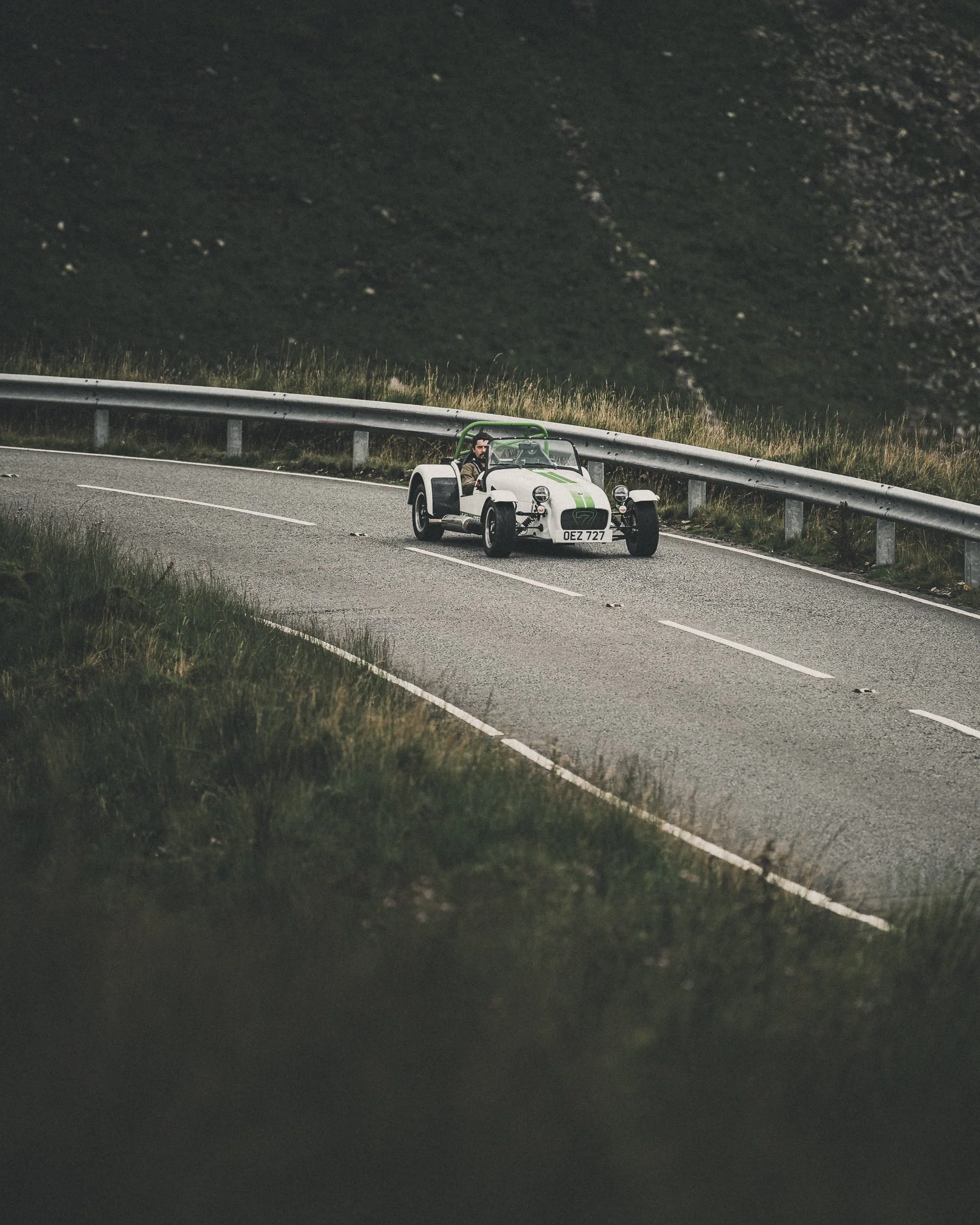 Caterham Seven on a winding mountain road