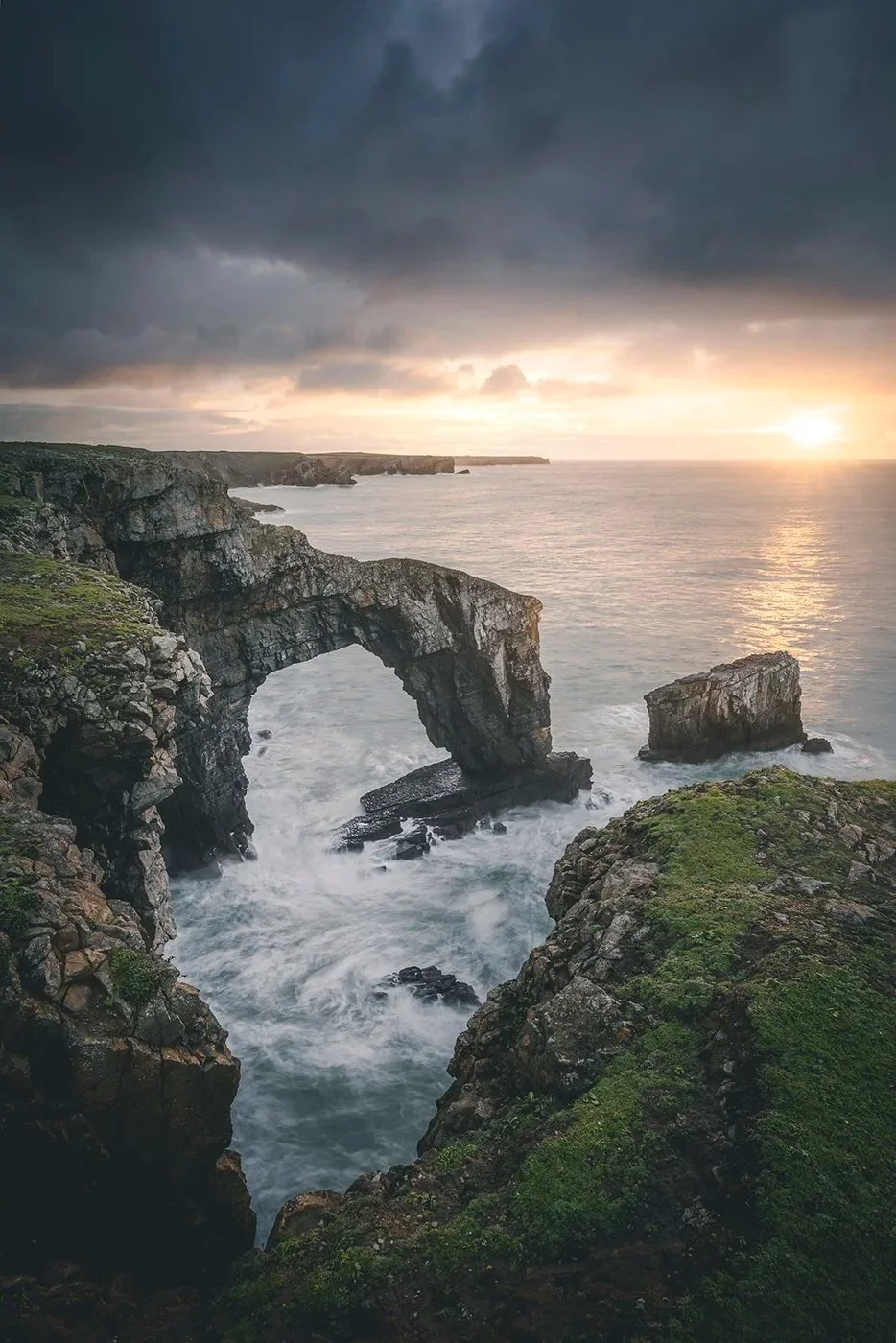 Green Bridge of Wales sea arch at sunset, Pembrokeshire