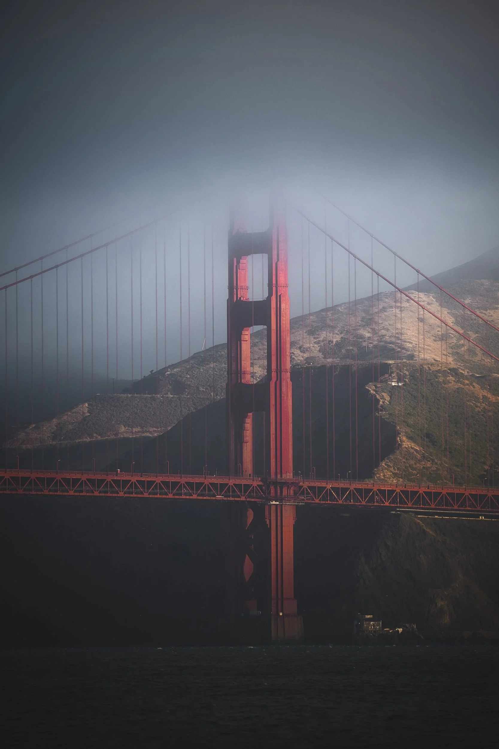 Golden Gate Bridge emerging from fog, San Francisco
