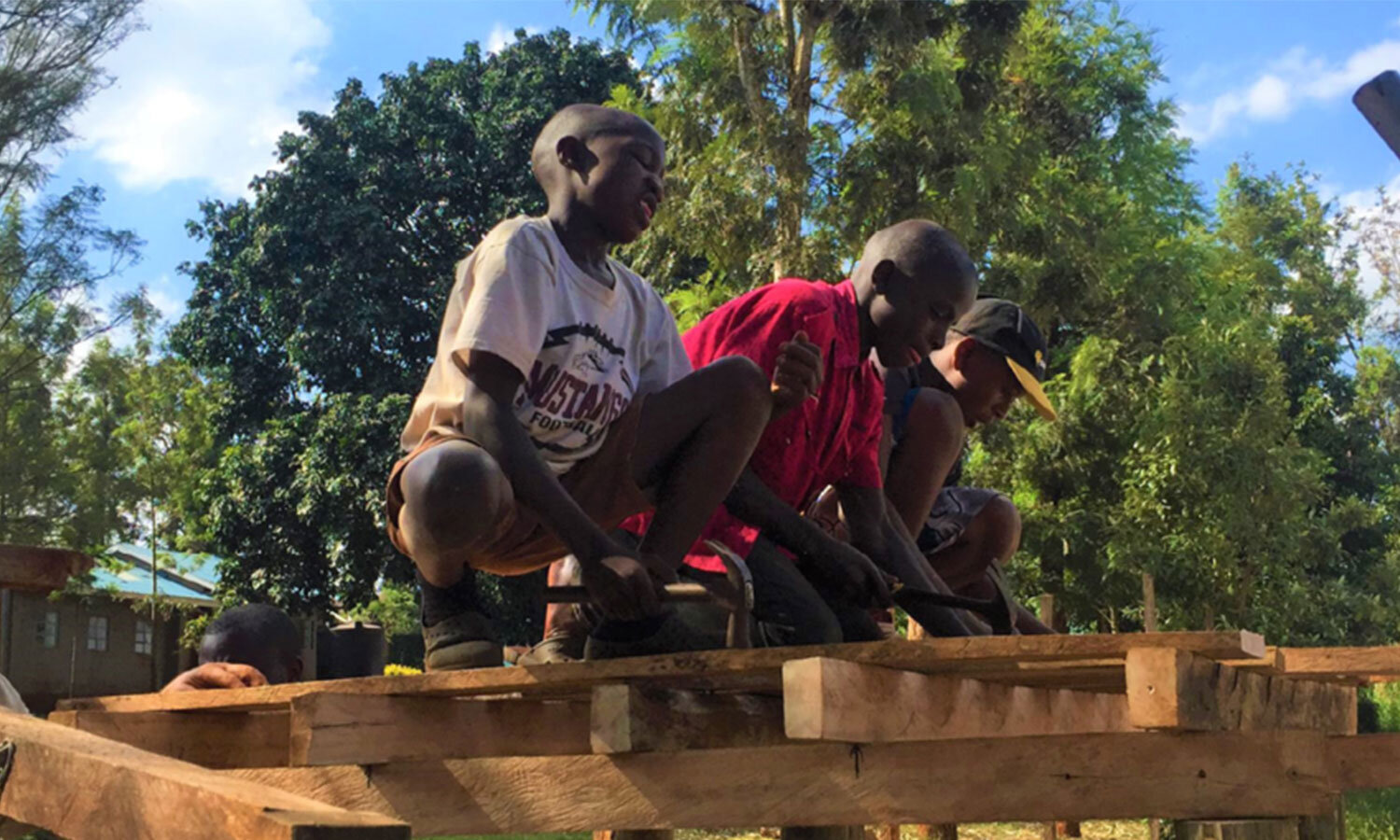   The TGE volunteers taught basic construction skills to some of the boys so they could help with the project and learn a new skill.  