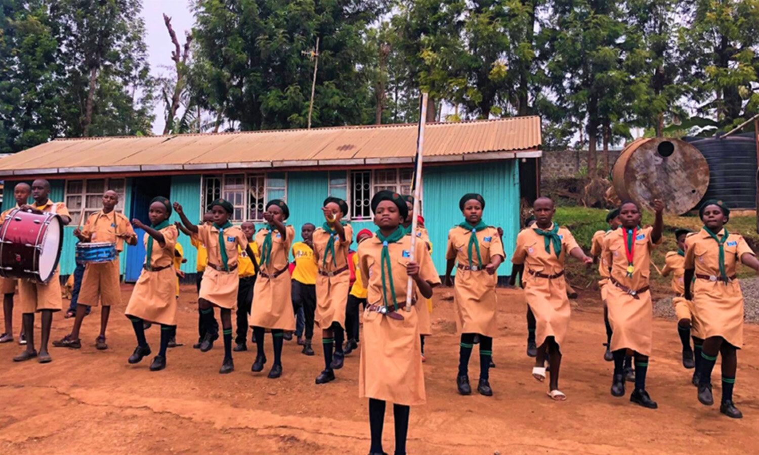   Kenya Scouts greet TGE on their way to Dream Children’s Home in the Ngong Hills.  