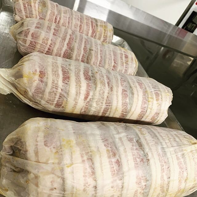 Rolling up the bacon wrapped meatloaf for our family style Valentine&rsquo;s Day popup dinner at @ngbdistillery tomorrow. We just opened up another seating at 6:30pm because we&rsquo;re nearly sold out! Visit NGBD.com/visit for more info.
_

#humblet