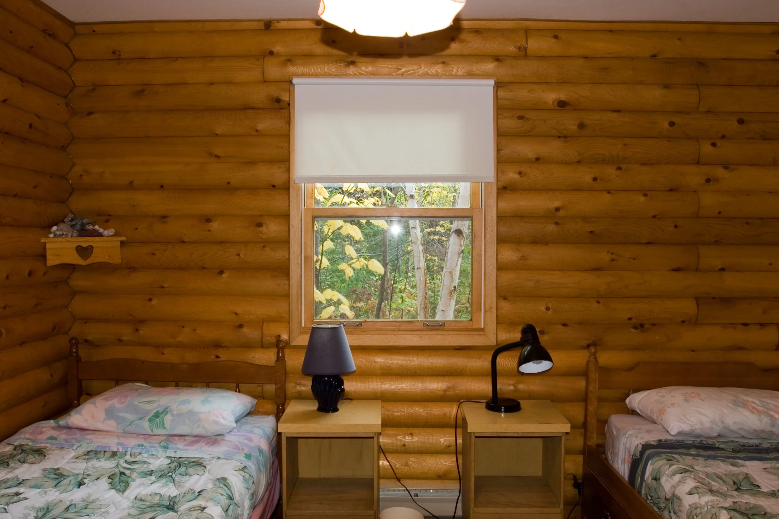 single beds log cottage.JPG