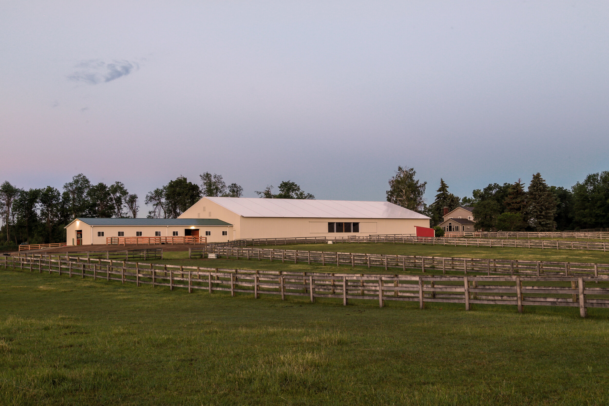 A custom 90’ x 178’ fabric roof metal riding arena in Oxford, Michigan.