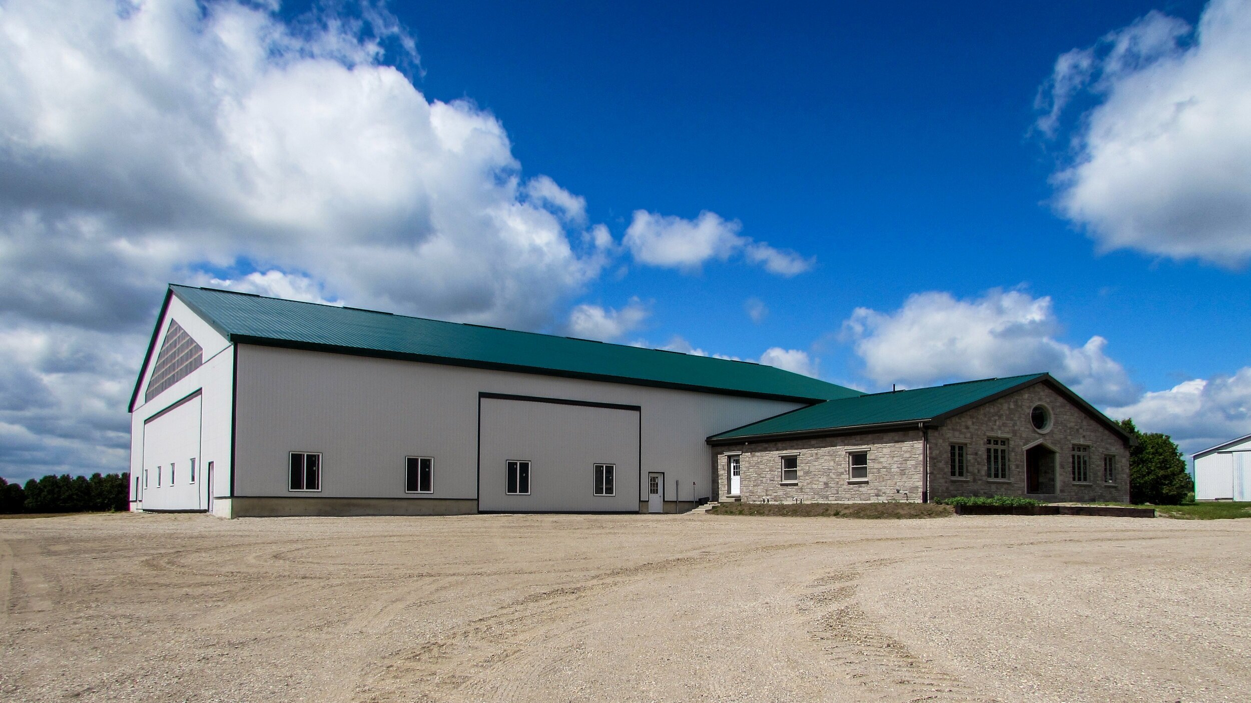 A custom 100’x 144’ steel roof storage building in Innerkip, Ontario.