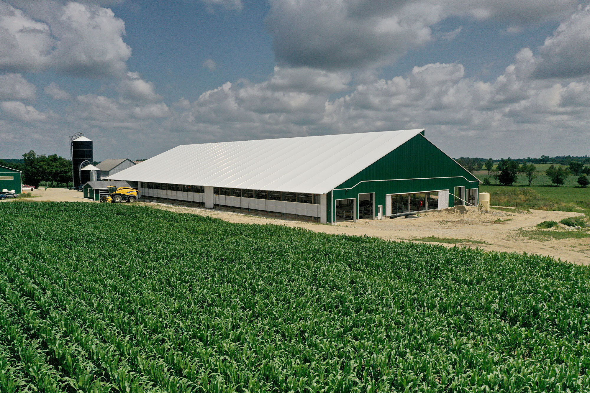 A custom 135’x 288’ fabric roof metal dairy barn in Southgate, Ontario.