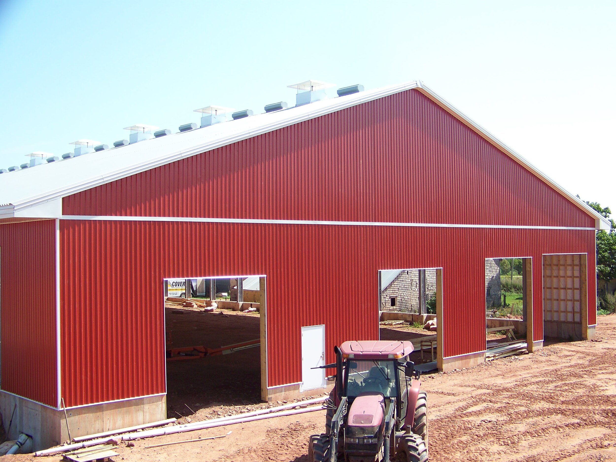 A custom 93’x 158’ steel roof metal dairy barn in Freetown, Prince Edward Island.