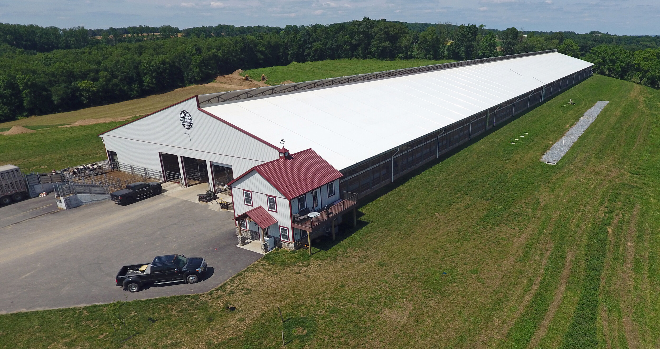 The front of Gutman Farm's fabric roof dairy barn. 