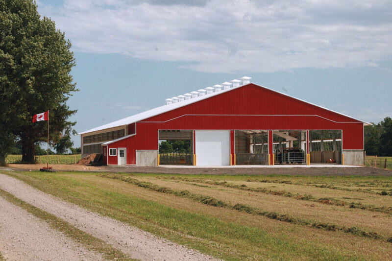 A custom 128’x 210’ fabric roof metal beef barn in Harriston, Ontario.