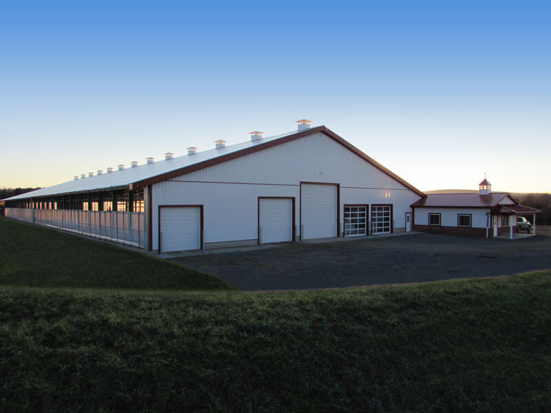 A custom fabric roof metal frame dairy barn in Trout Run, Pennsylvania.