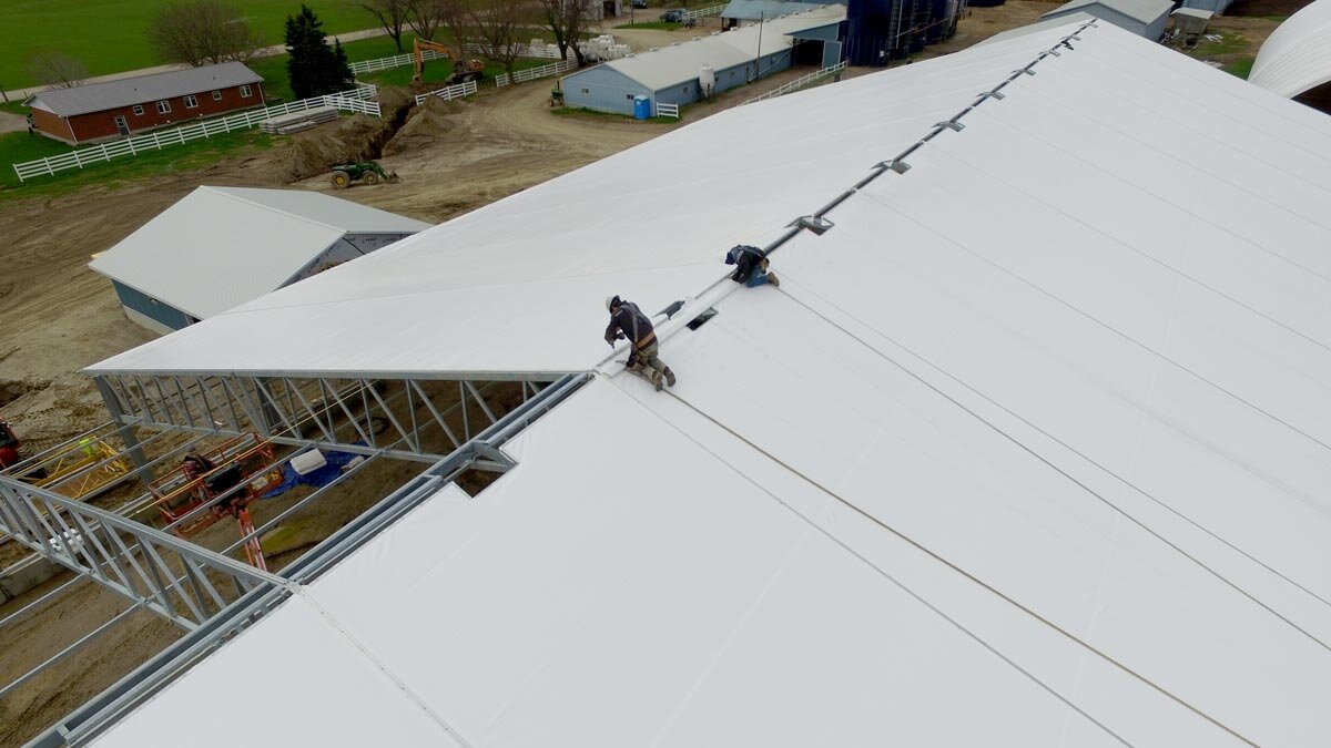  The fabric roof paneling of a WeCover custom barn. 