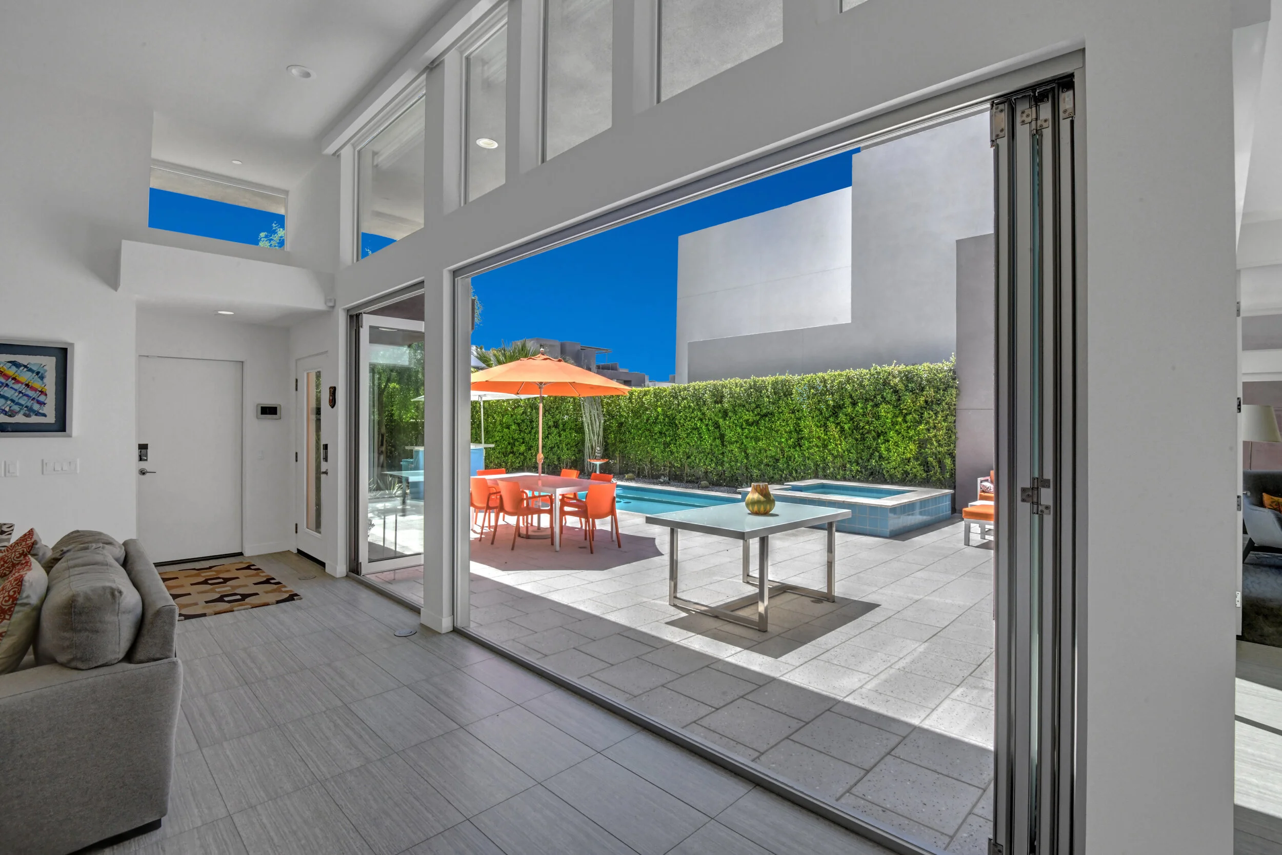 LIVING ROOM INDOOR OUTDOOR TO POOL.jpg