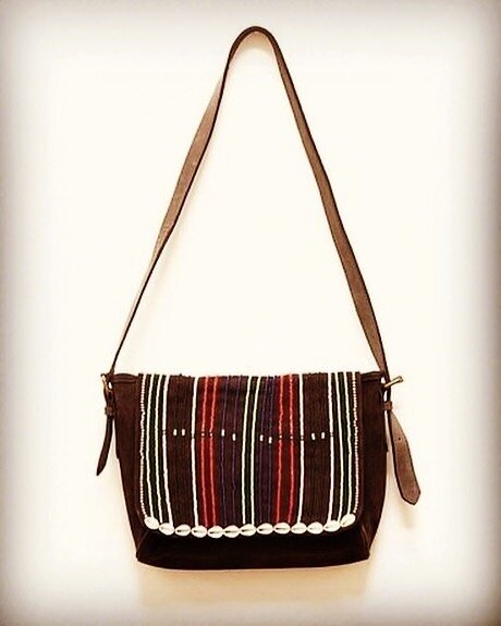 Maasai Shell &amp; Beaded Leather Shoulder Bag.  Hand made in Kenya. Lined &amp; has 3 pockets. Quality craftsmanship.  14&rdquo; L x 9&rdquo; H x 3 &ldquo; W. $ 250.  Link in profile. 💯% profit funds skills building projects for women, conservation