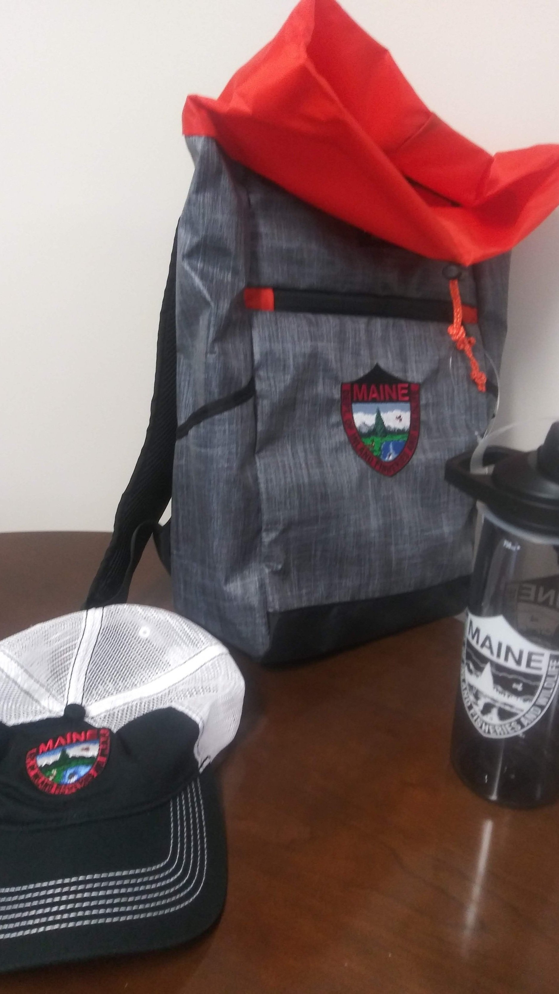 IF&W gear package: hat, backpack, and water bottle