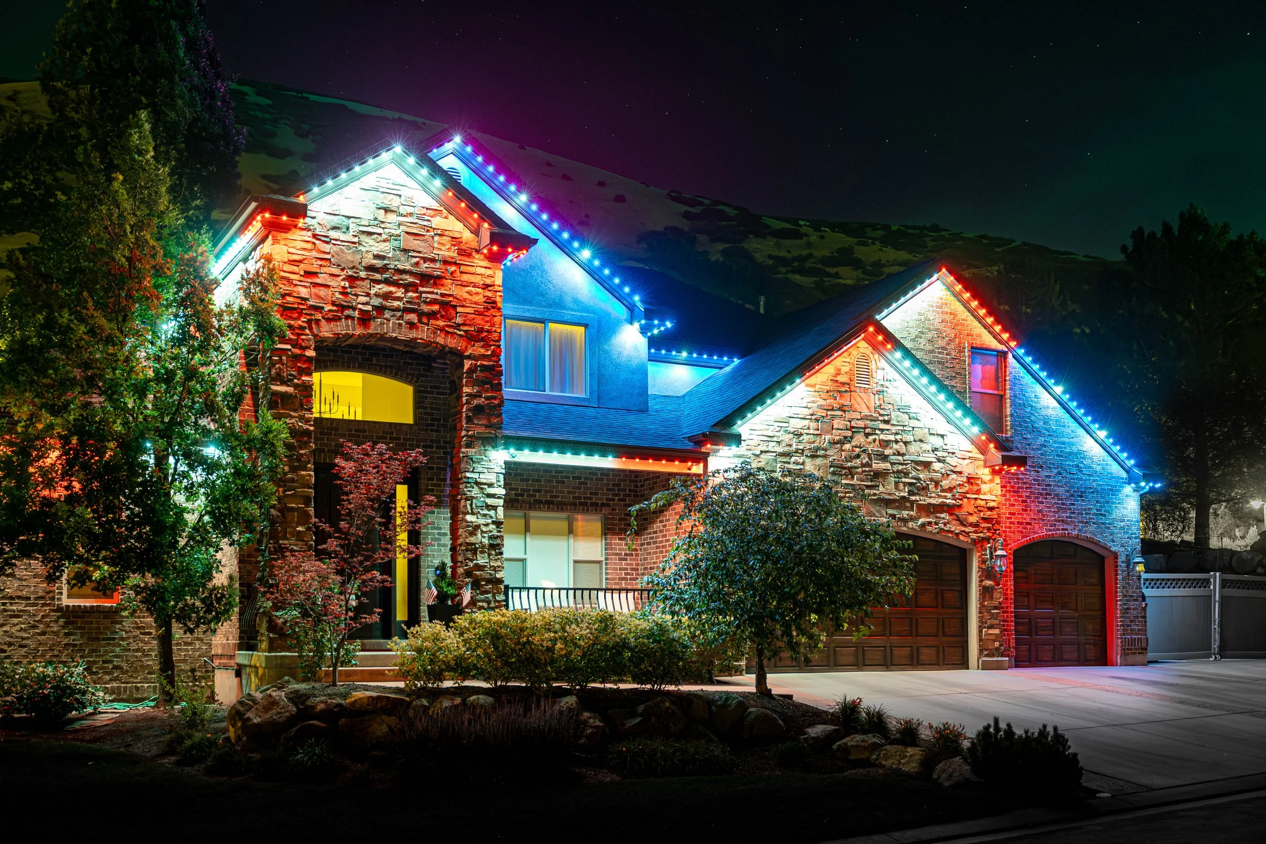Permanent residential lighting installed on a Utah home