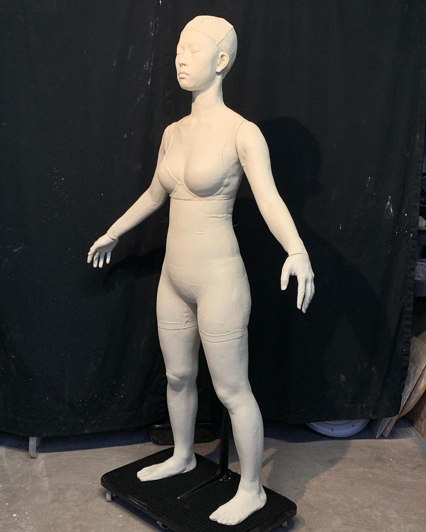 Full body cast of a client. 
My client will use this as a form to make complicated cosplay outfits. It&rsquo;s articulated at the waist, the arms and hands are removable (magnetic attachments).
I did the client body casting before Covid then had it i