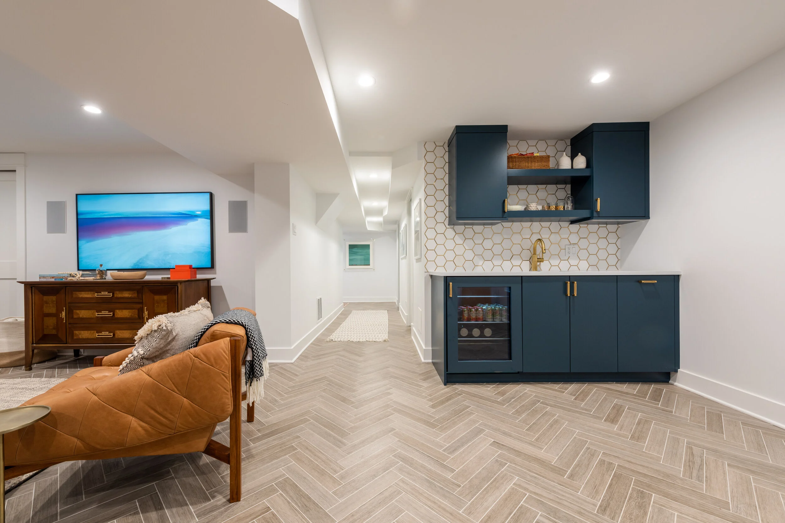 The basement bar, finished in Hague Blue from Farrow & Ball.