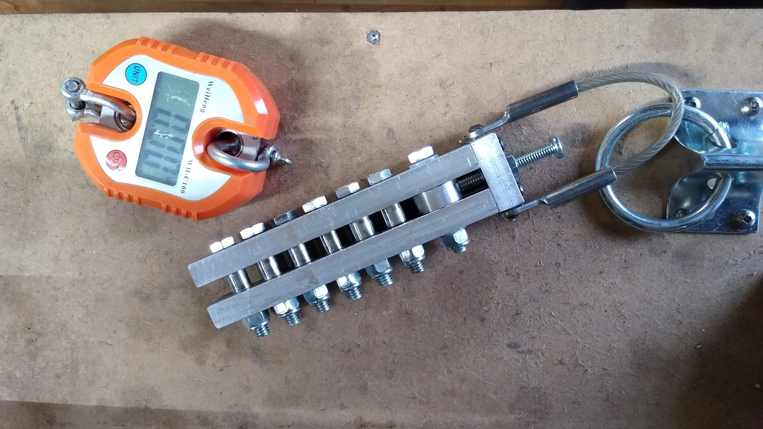 The tensioning device and scale used for testing