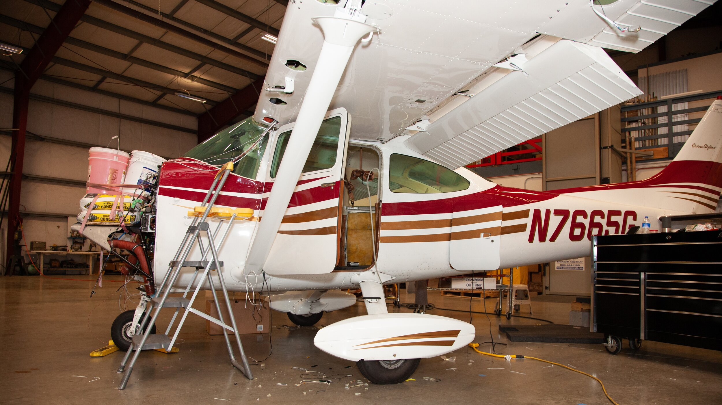 Safety in Motion Maintenance Services image of plane in repair.jpg