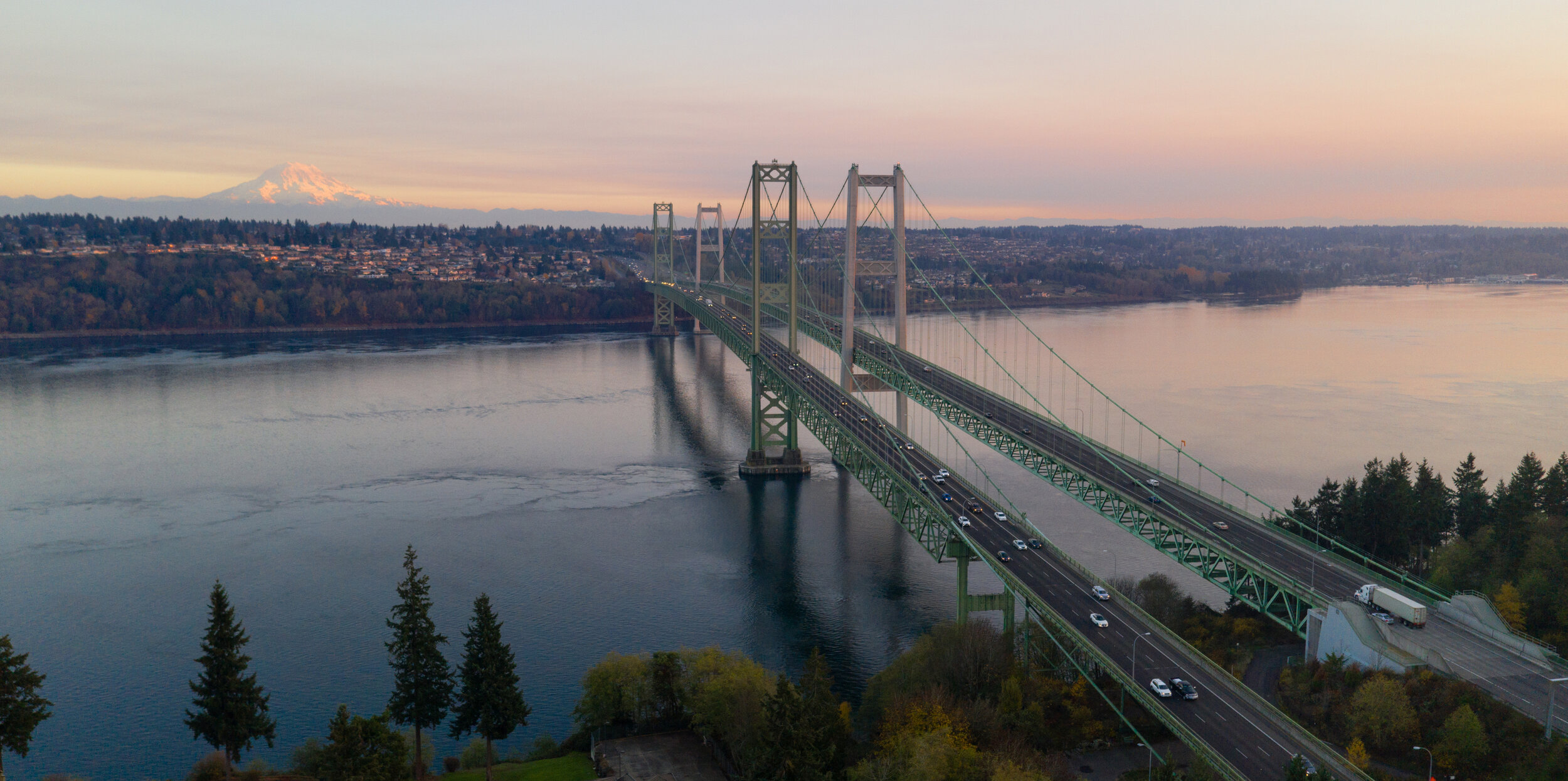 Aerial View Tacoma Narrows Bridges over Puget Sound Mount Rainier in the background