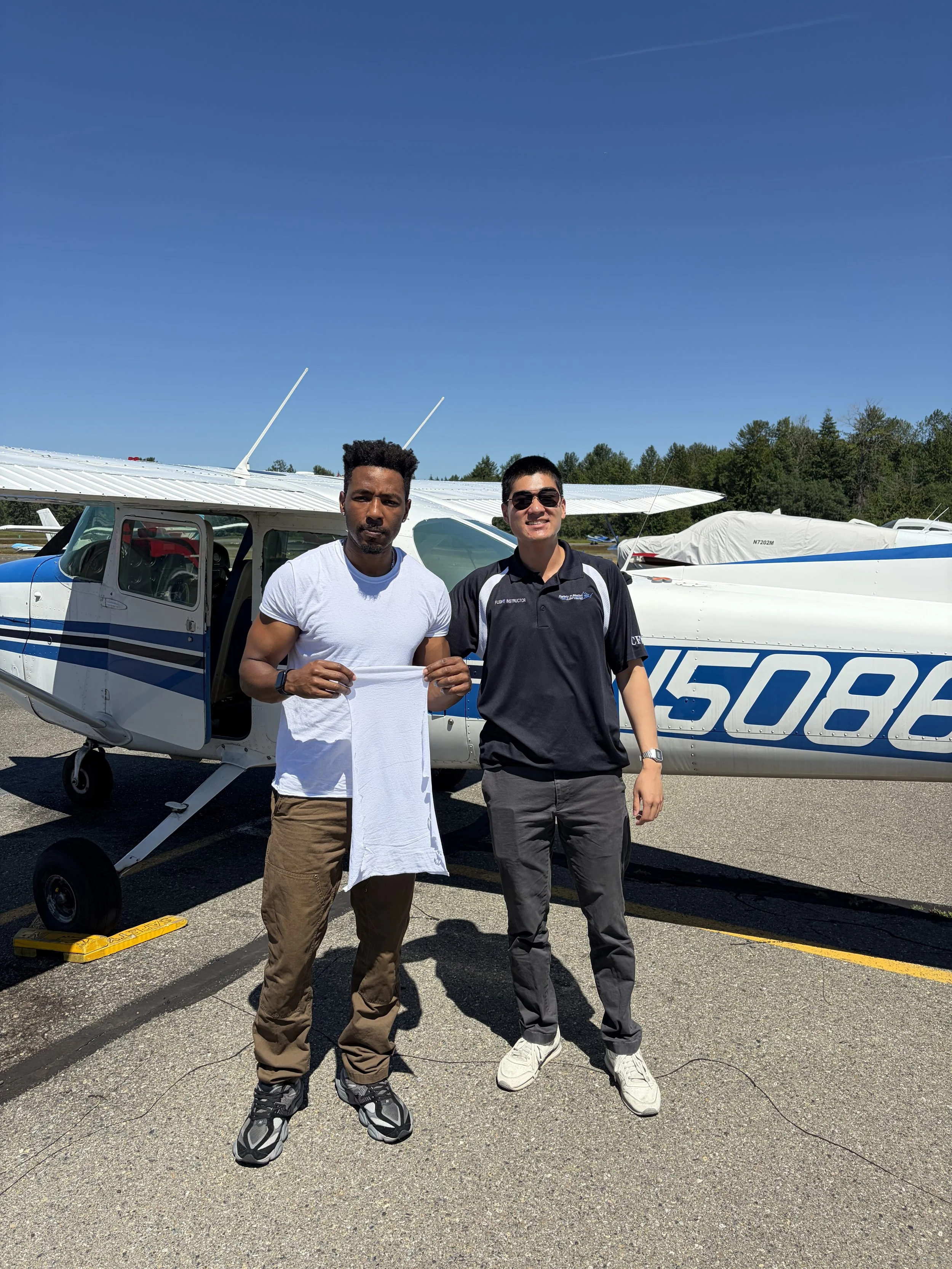 The traditional cutting of the shirt for Daniel Berhe's first SOLO flight by his CFI, Jeremy Dao.  Congratulations Daniel!! 