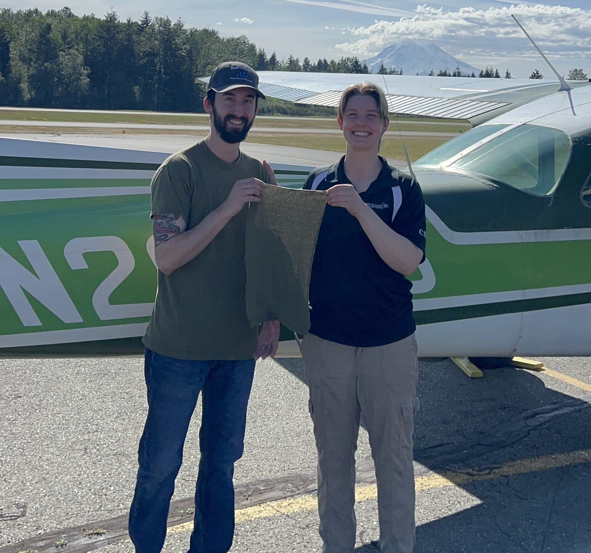The traditional cutting of the shirt for Kevin Jacques first SOLO flight by his CFI, Kylie Eastman.  Congratulations Kevin!